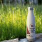 LWSC_Red_Sails_Sailboat_ater_bottle_WaterBottle_Outdoor_grass_Mockup.png_15928001