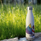 LWSC_sunfish_sailing_boat_water_bottle_WaterBottle_Outdoor_grass_Mockup.png_15927985